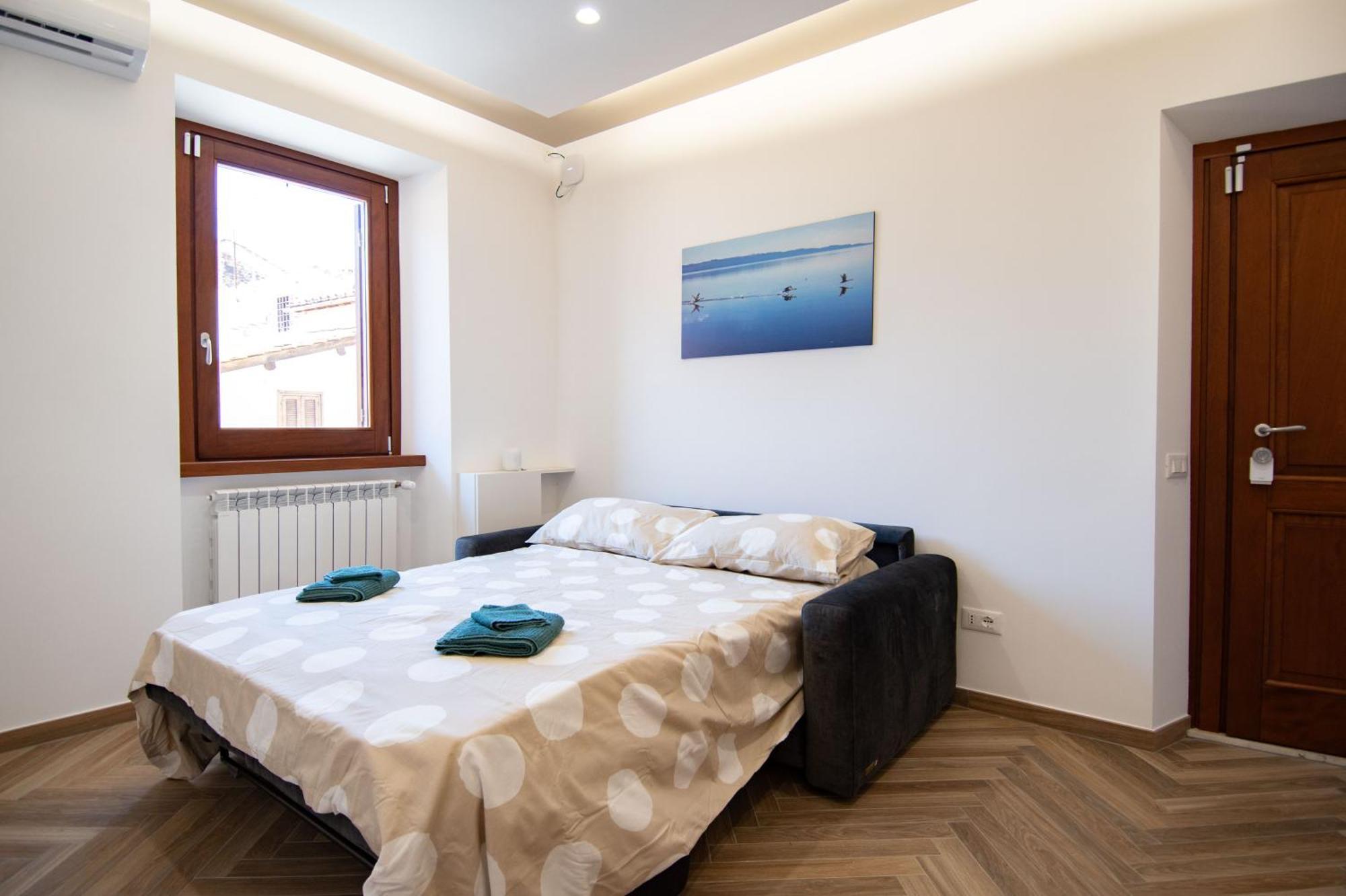 Finestra Sul Borgo Appartement Trevignano Romano Buitenkant foto